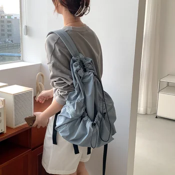 2023 Alkalmi egyszerű húzás könnyű súly Iskolatáska Koreai nagy kapacitású utazási hátizsák női divat nylon mochilas para mujer